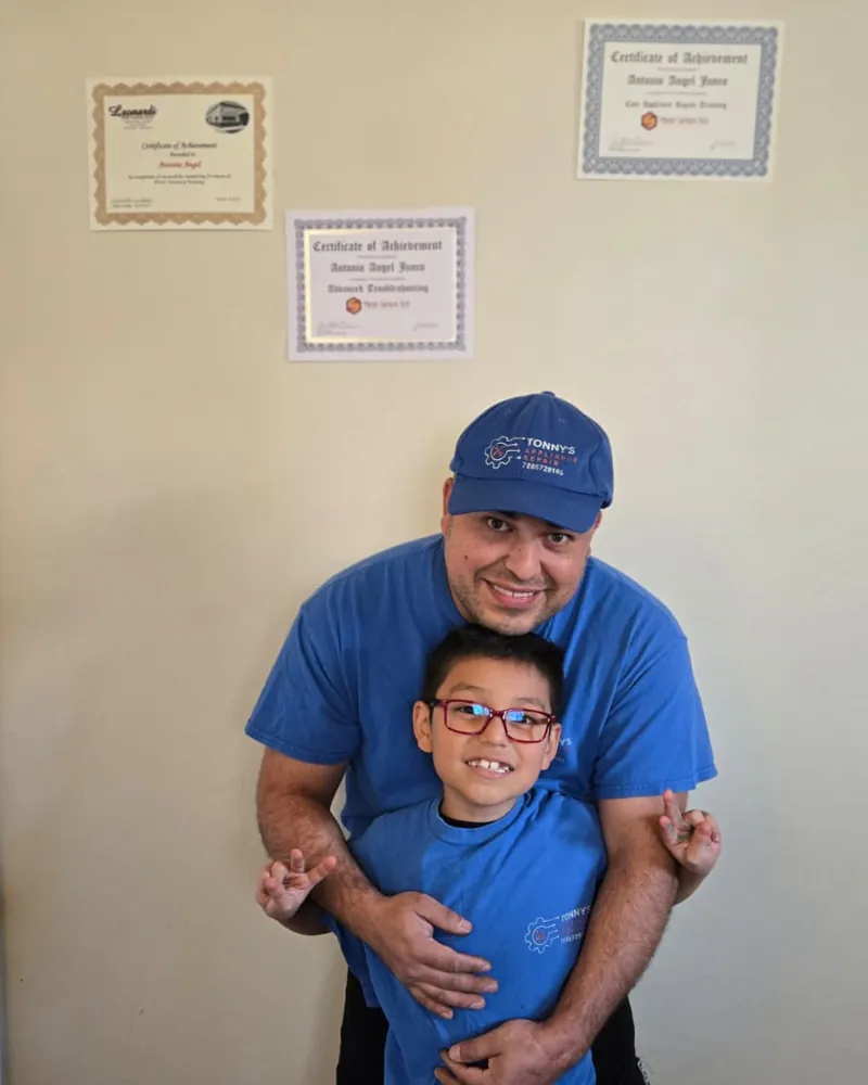 Appliance Repair 81 Tony Junco and his son in Tonny's Appliance Repair shirts, a family-owned business in Westminster, CO